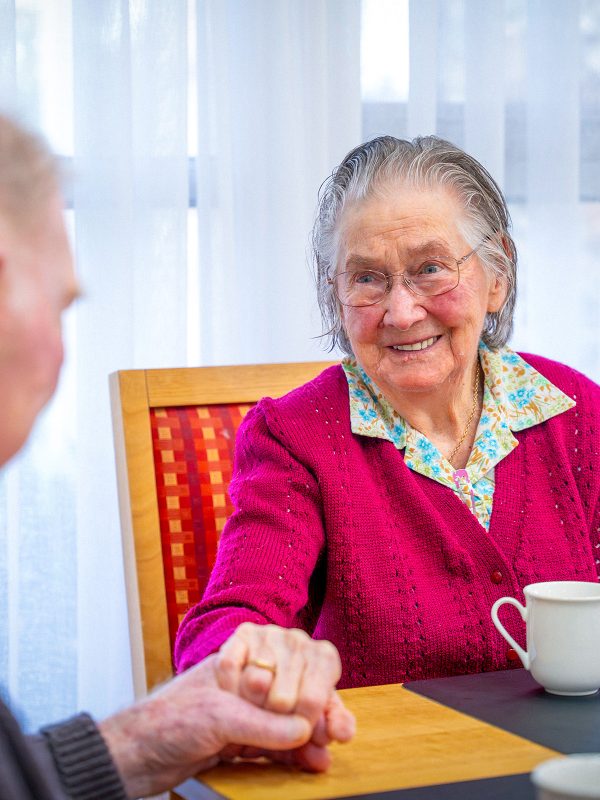 BAPTCARE ABBEY GARDENS resident couple holding hands