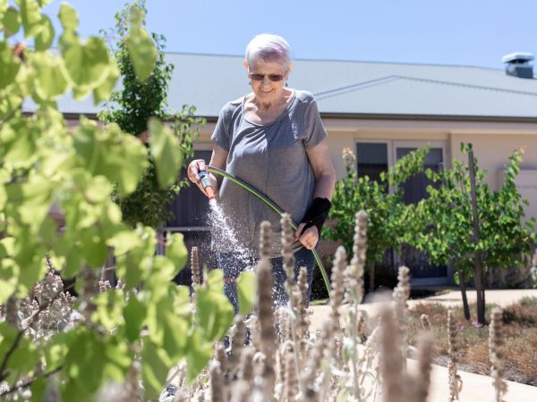 BAPTCARE ABBEY GARDENS resident watering the garden