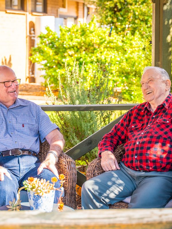 BAPTCARE NORTHAVEN Resident friends sharing stories from their day in the gazebo