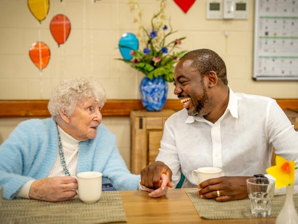 BAPTCARE NORTHAVEN Resident with staff member sharing a laugh