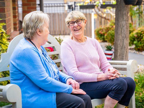 BAPTCARE ST HILARYS resident and staff member friends outside enjoying the sun