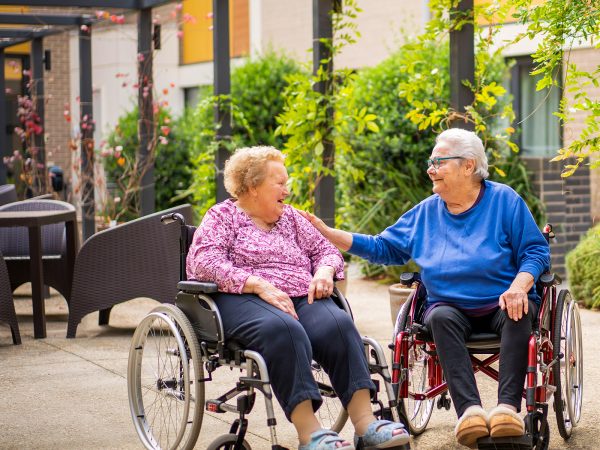 BAPTCARE WATTLE GROVE two resident in conversation