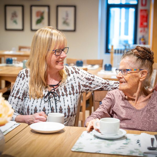 BAPTCARE Wyndham Lodge Mother and Daughter in Cafe chatting