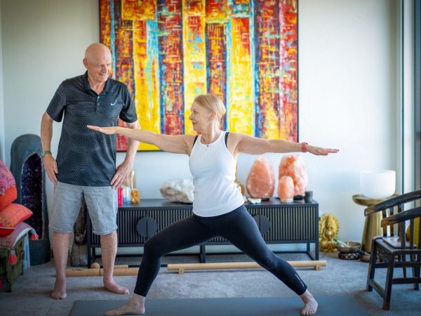Residents doing yoga in their Baptcare Strathalan Retirement Living apartment
