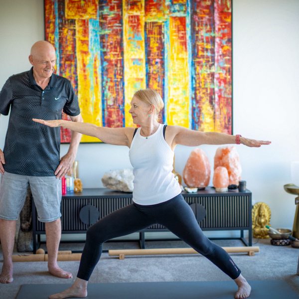 Residents doing yoga in their Baptcare Strathalan Retirement Living apartment