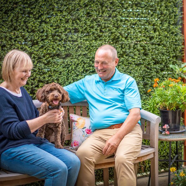 Residents in garden courtyard at their Baptcare Strathalan Retirement Living villa