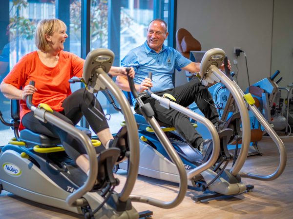 Resident couple in the gym at Baptcare Strathalan Retirement Living community hub