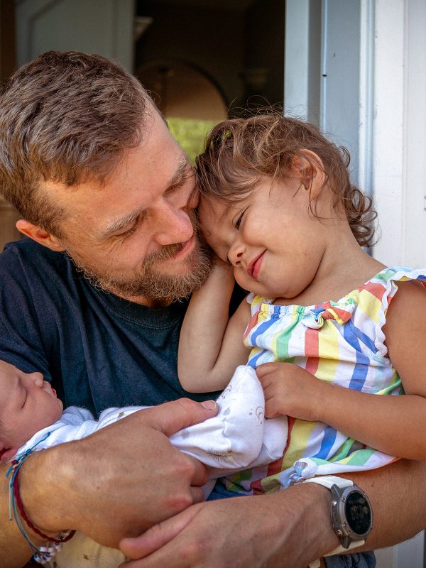 FAMILY COMMUNITY Dad hugging daughter and newborn baby together, very touching and cute, much love