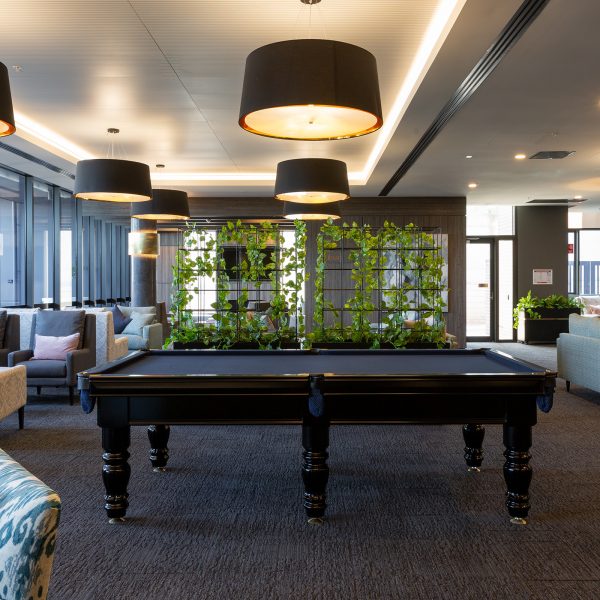 Architectural Render of the pool table at The Orchards Retirement Living community hub