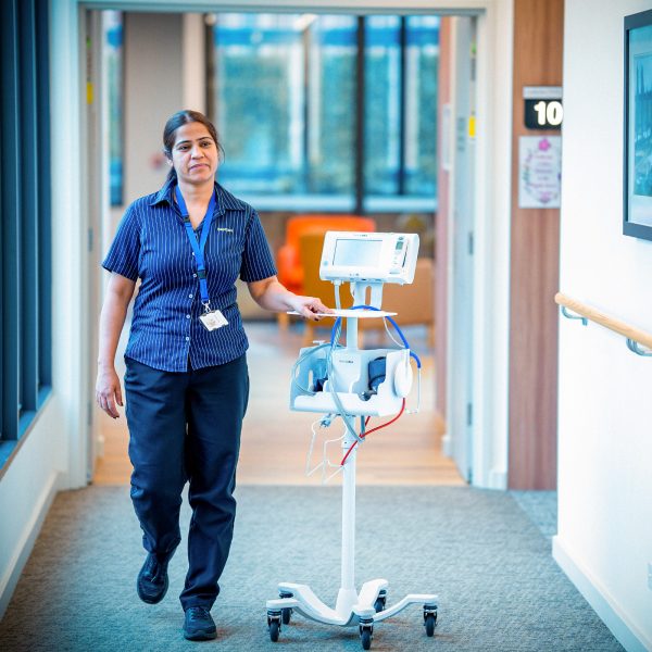 CAREERS Registered nurse doing the rounds of residents in a residential aged care home