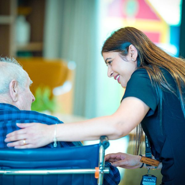 CAREERS Nursing coordinator having a conversation with a resident in a residential aged care home