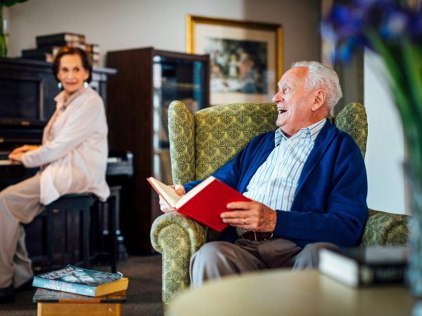 BAPTCARE THE ORCHARDS Residents with one at the piano the other singing