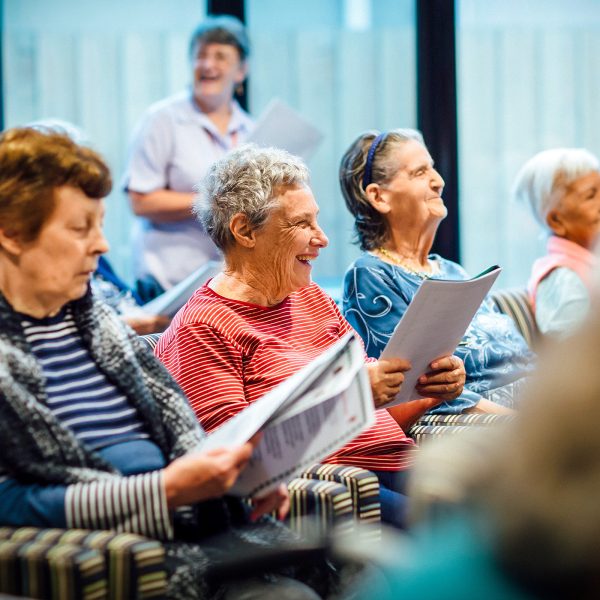 BAPTCARE THE ORCHARDS Residents singing in common area