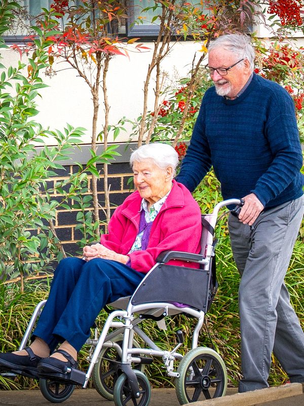 BAPTCARE STRATHALAN resident and her son going for a walk