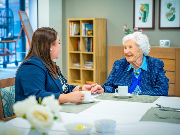 BAPTCARE STRATHALAN resident and staff member coffee and chat