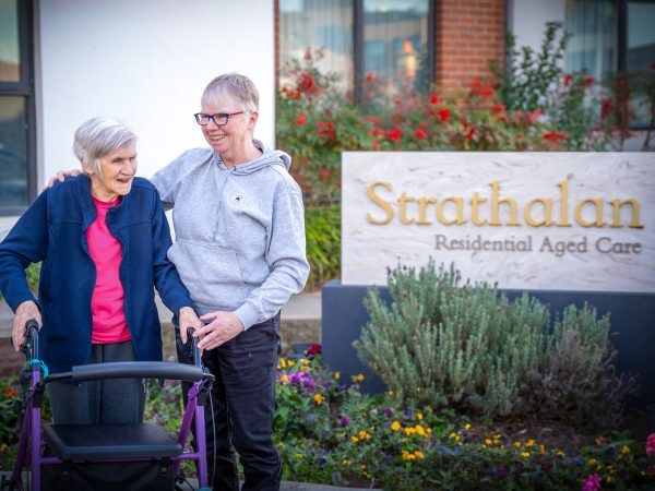 BAPTCARE STRATHALAN resident and her daughter at the front entrance