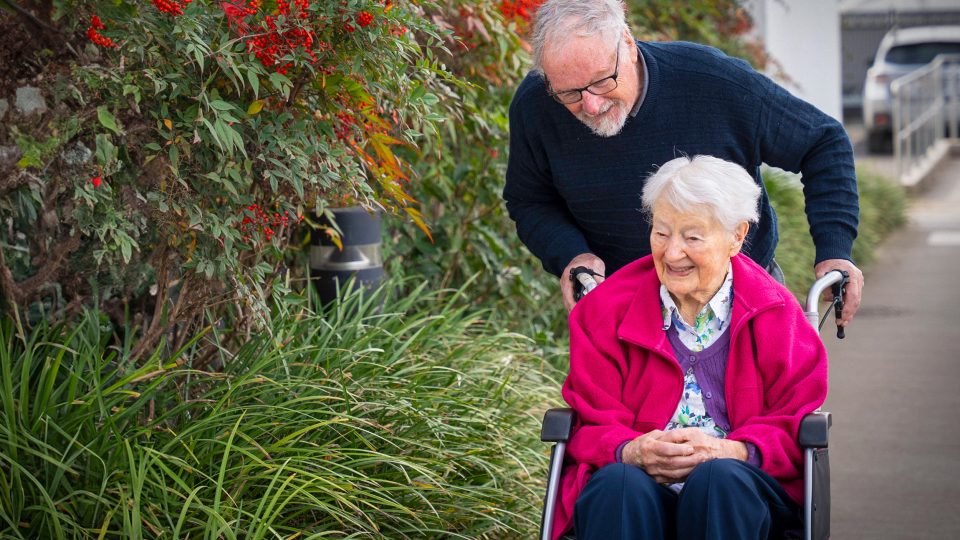 BAPTCARE STRATHALAN resident and her son going for a walk