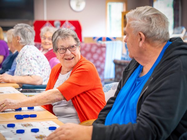 BAPTCARE KARINGAL Residents playing bingo sharing a laugh