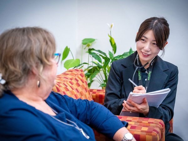 HOME CARE nursing staff member with a CHSP customer at home visit checkup