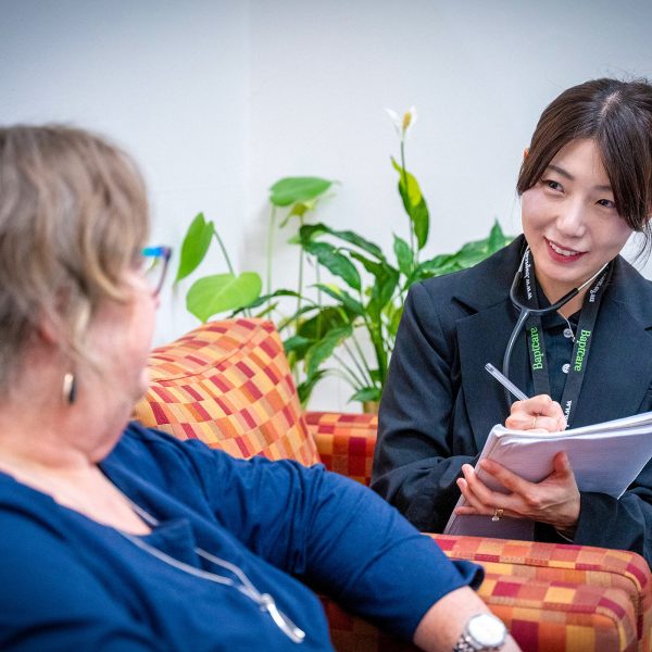 HOME CARE nursing staff member with a CHSP customer at home visit checkup