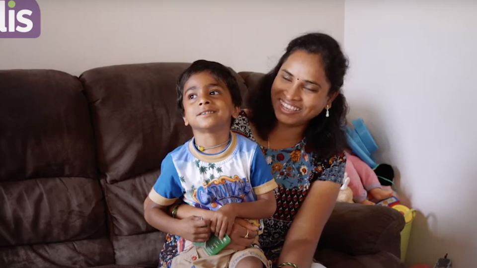 Woman hugging child